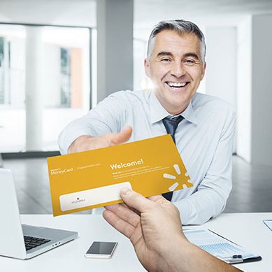 man-handing-card-to-client